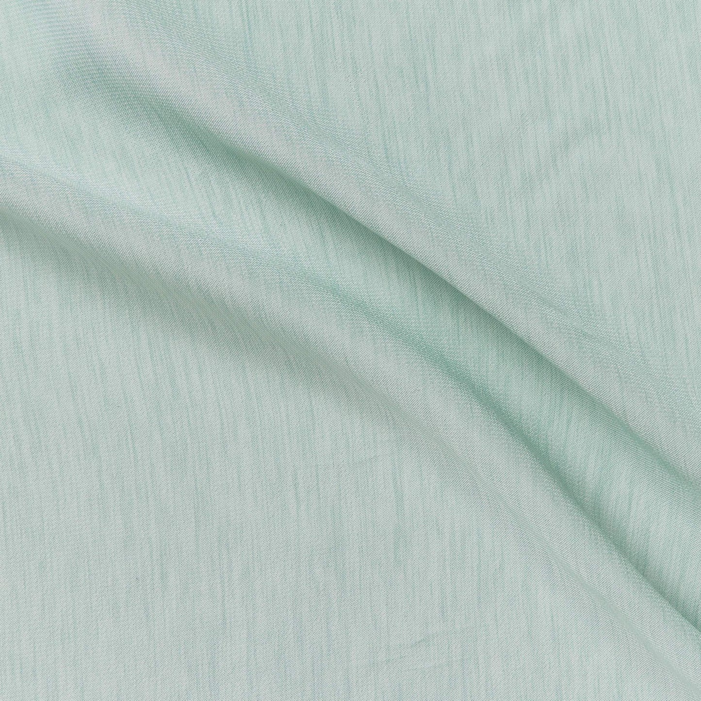 Presenting minaret in the mineral blue color version of a Light-weight cool handle soft pure polyester with fluid drape and textured lines