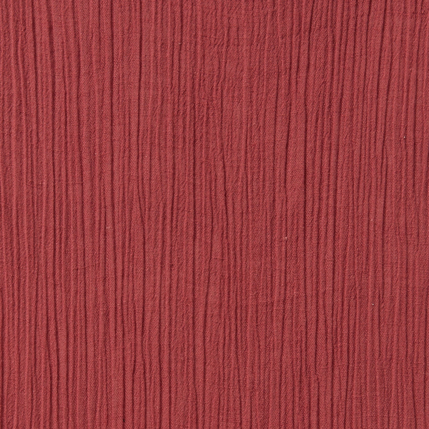 muslin presenting the garnet color version of a pure breathable soft and natural cotton muslin with yoryu crinkle textured face