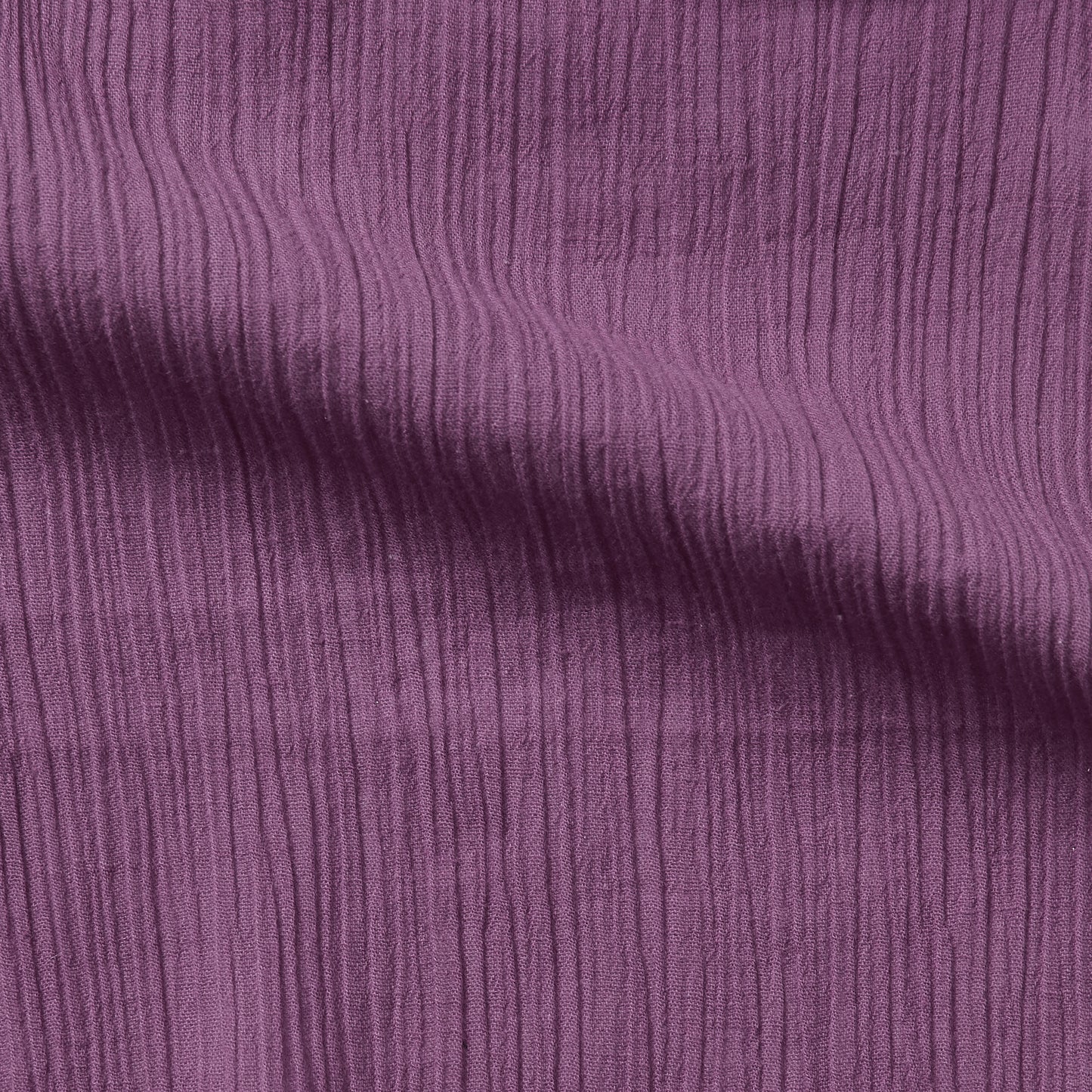 muslin presenting the mulberry color version of a pure breathable soft and natural cotton muslin with yoryu crinkle textured face
