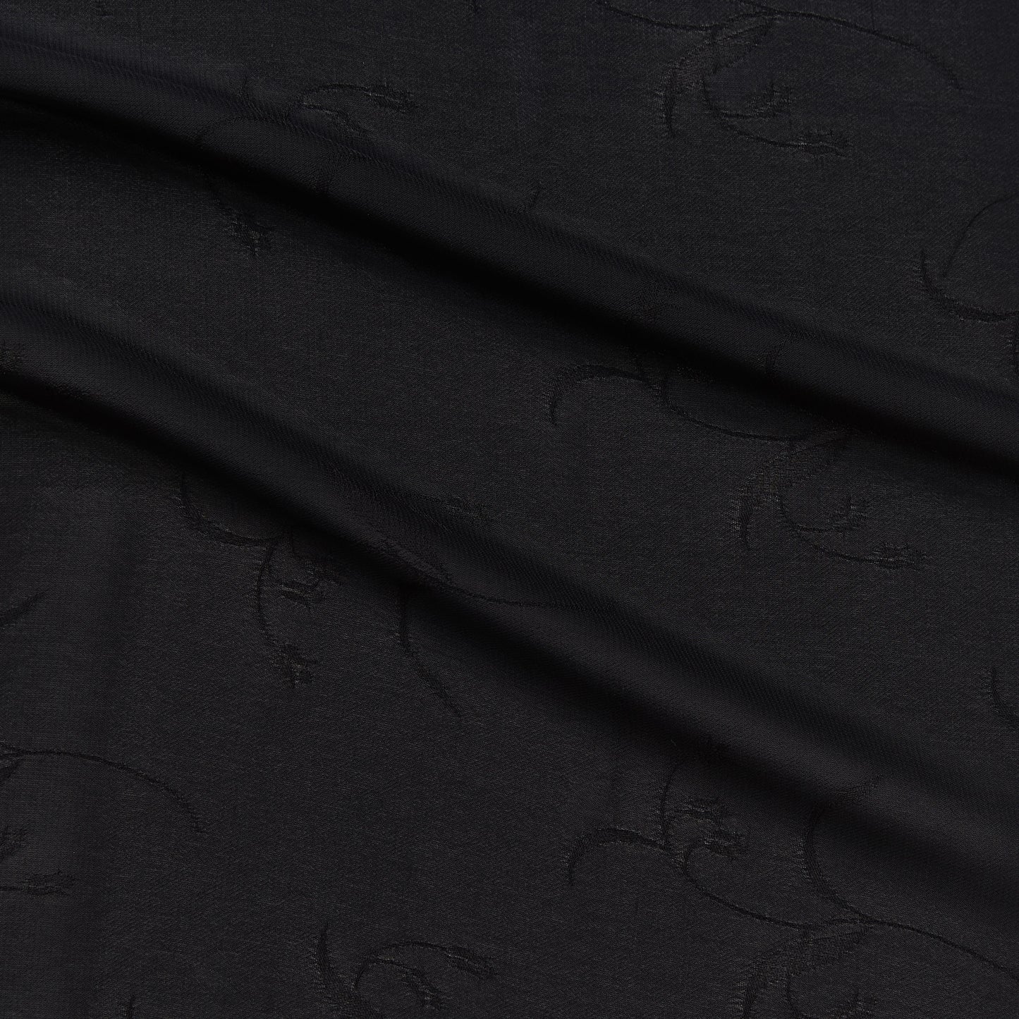 myth presenting the black color version of a light weight floral jacquard pure rayon georgette with good drape