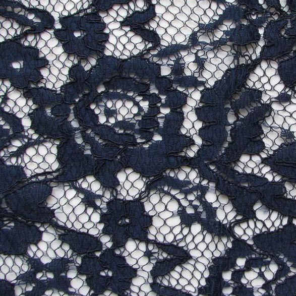 Mayfair presenting the Indigo color version of a rayon and nylon classic rochelle lace with rose design and double scalloped edge
