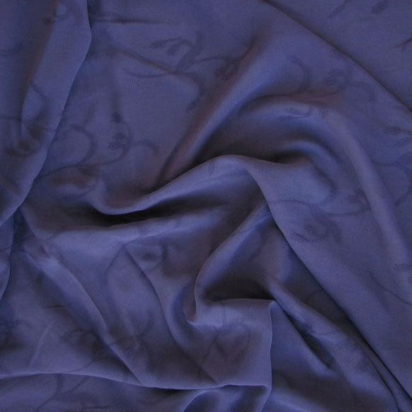 myth presenting the aubergine color version of a light weight floral jacquard pure rayon georgette with good drape