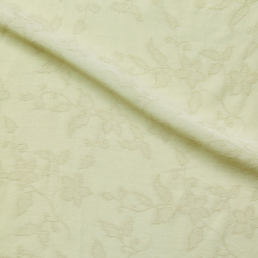 Noumea presenting the fern color version of a delicate floral embroidered light weight breathable pure rayon with good drape