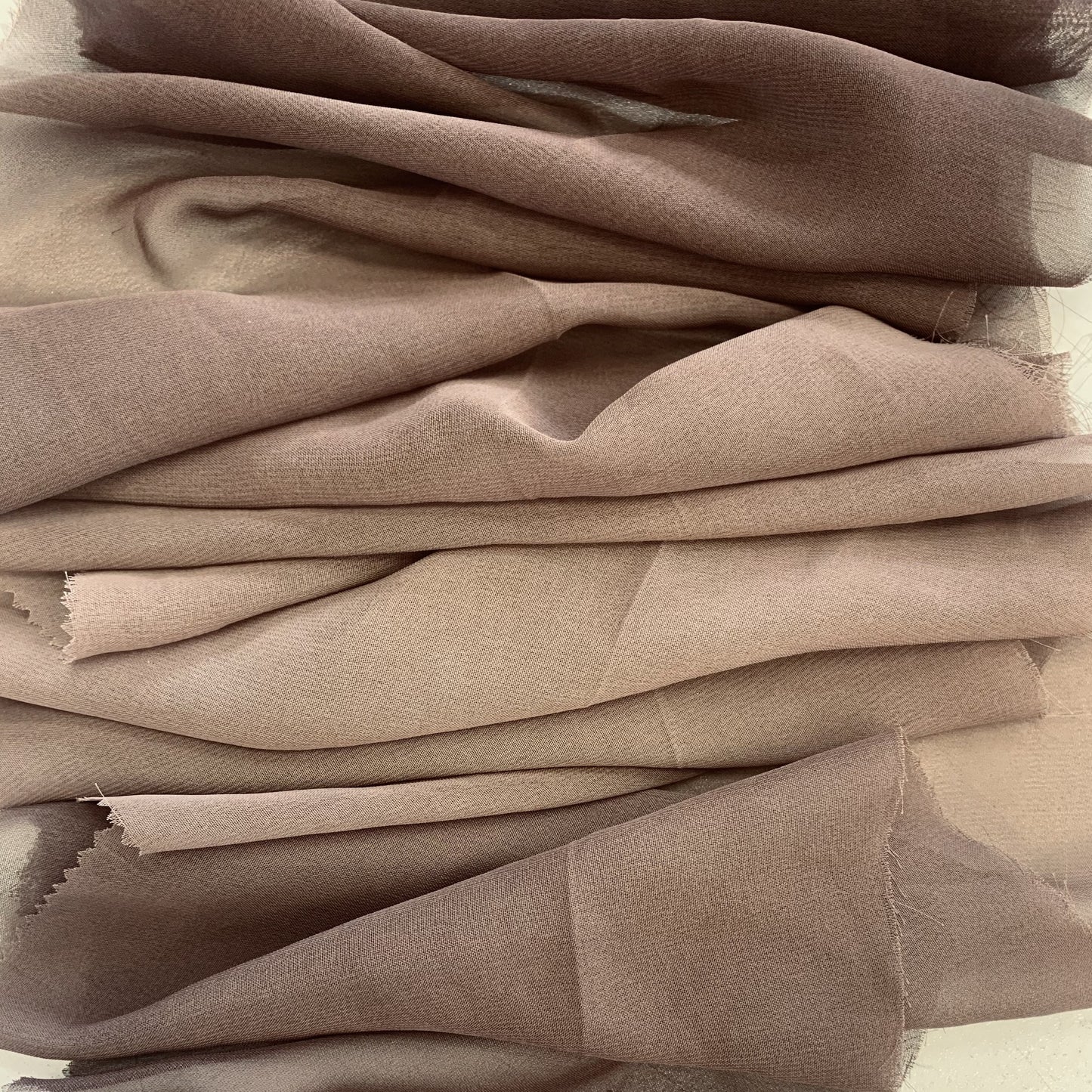 ombre presenting the chocolate colored version of Ombré dip dyed sheer and soft pure polyester chiffon