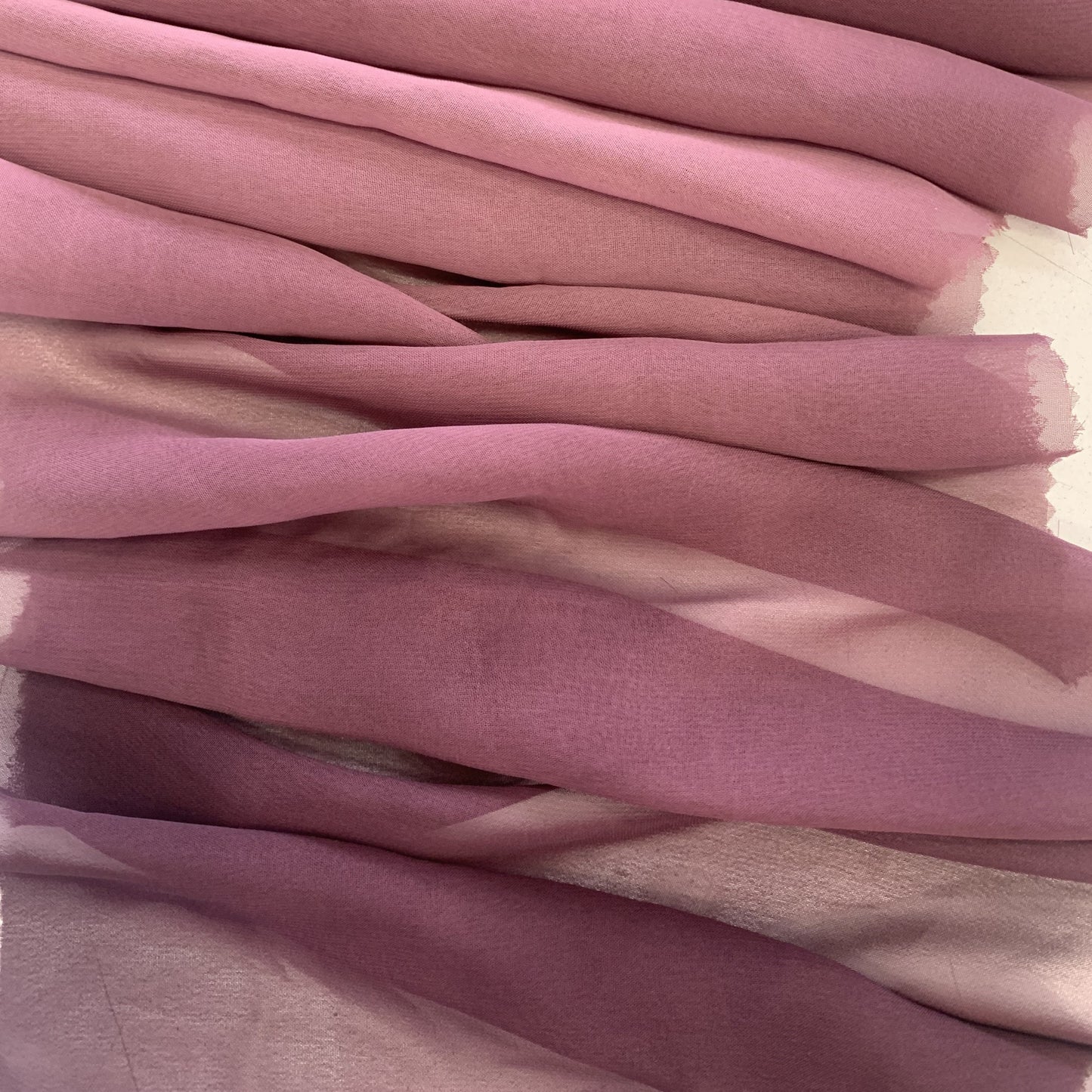 ombre presenting the pink color version of Ombré dip dyed sheer and soft pure polyester chiffon