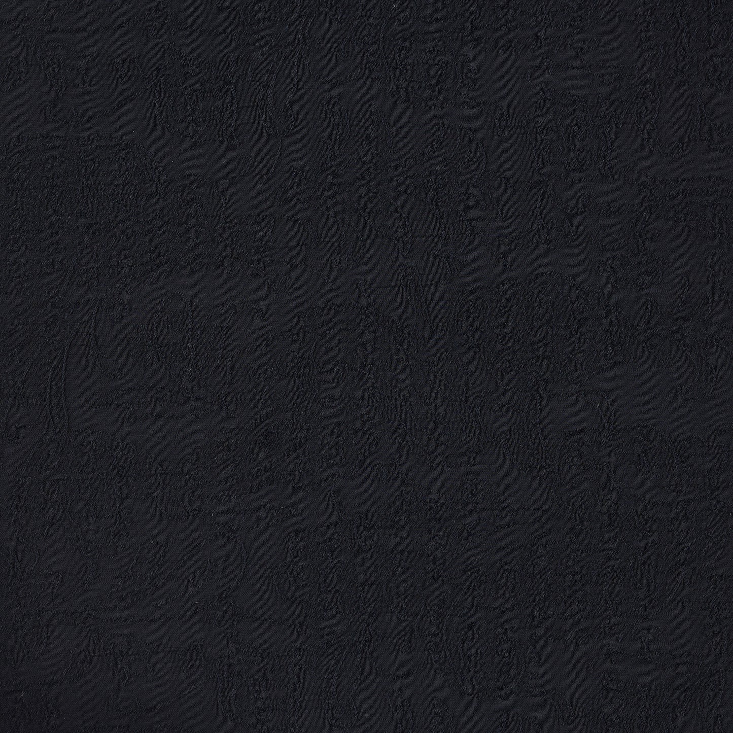 paisley showing the navy color version of a delicate and feminine floral embroidery on a breathable polyester viscose blend with good drape