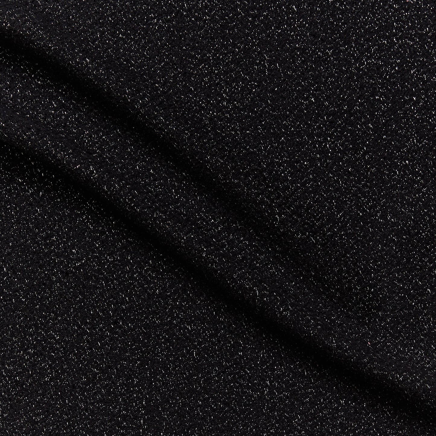 phoenix presenting the black color version of a textured tweed look yard dyed heavy weight pure silk with lurex highlights