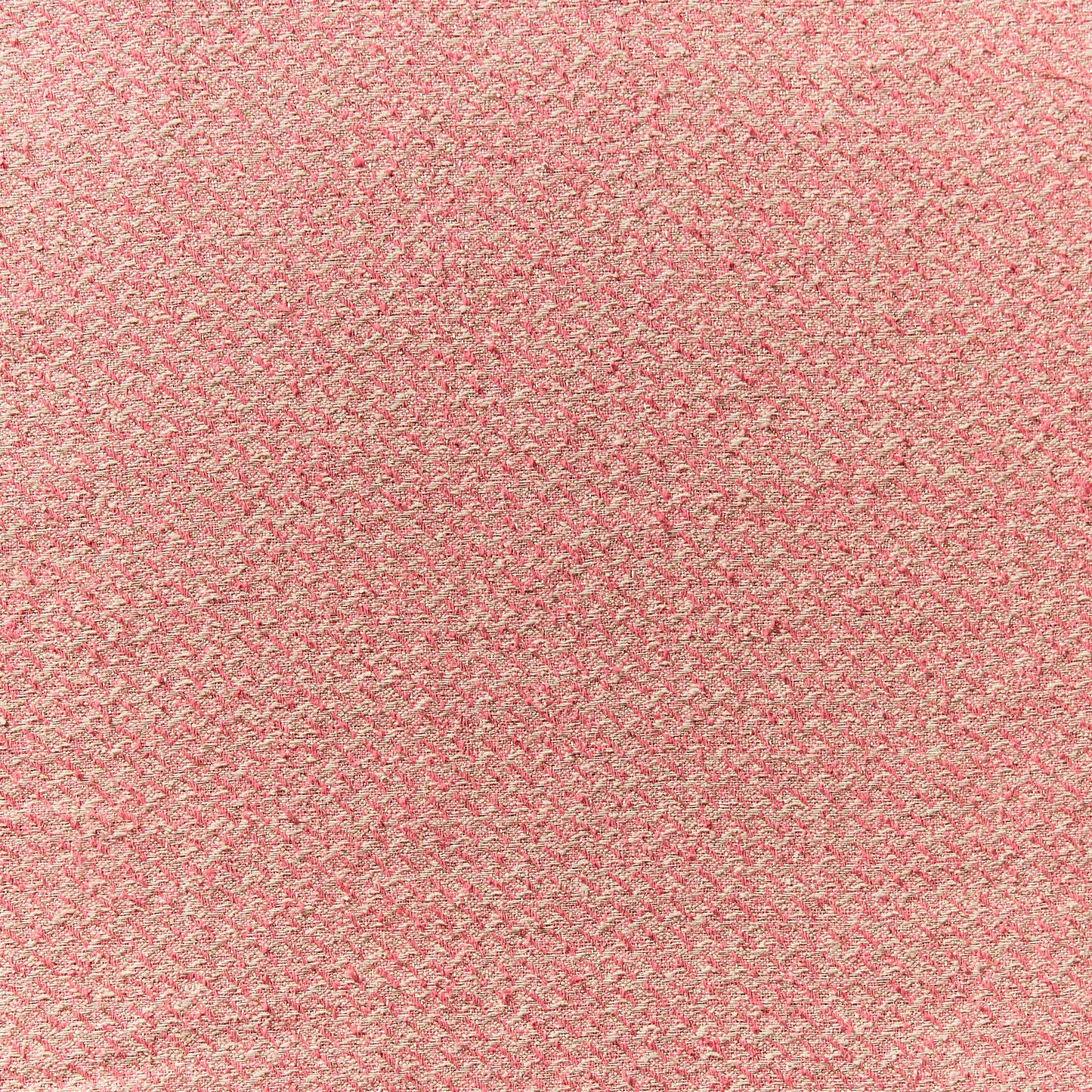phoenix presenting the coral color version of a textured tweed yard dyed heavy weight pure silk with lurex highlights