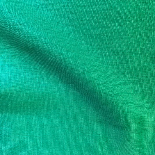rave on presenting the emerald color version of a Medium weight breathable pure linen with moderate drape
