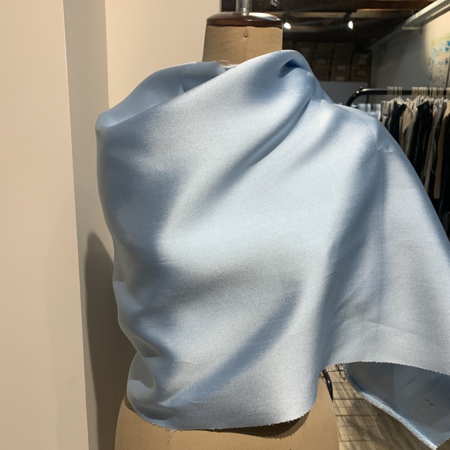 romeo displaying the blue color version of a pure Polyester Microfibre draped