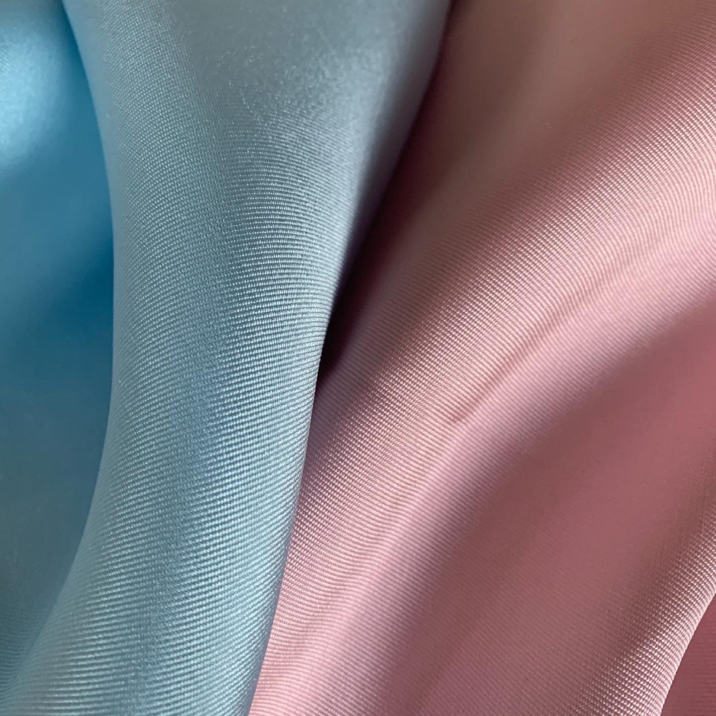 romeo presenting the  blue and pink color versions of pure Polyester Microfibre together