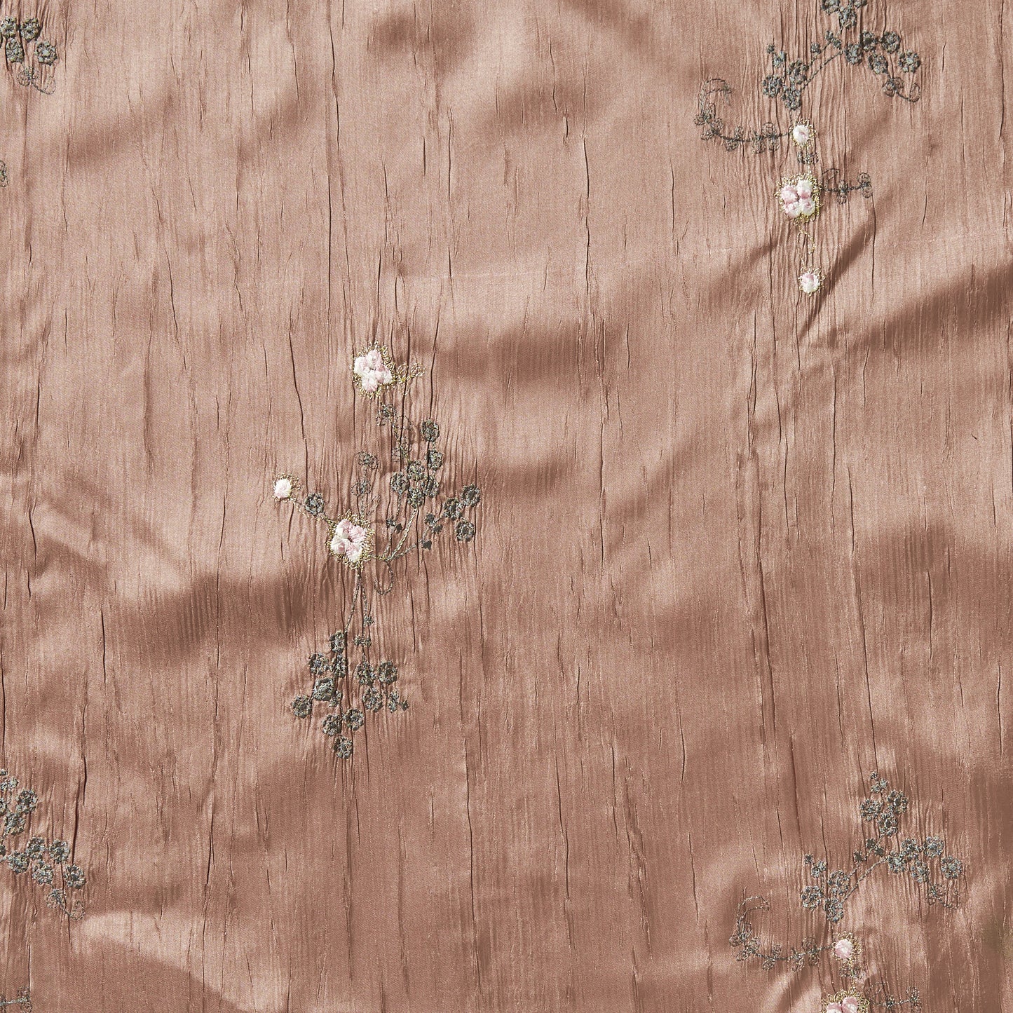 ruby presenting the mink color version embroidered with simple floral pattern crisp pure polyester crushed taffeta