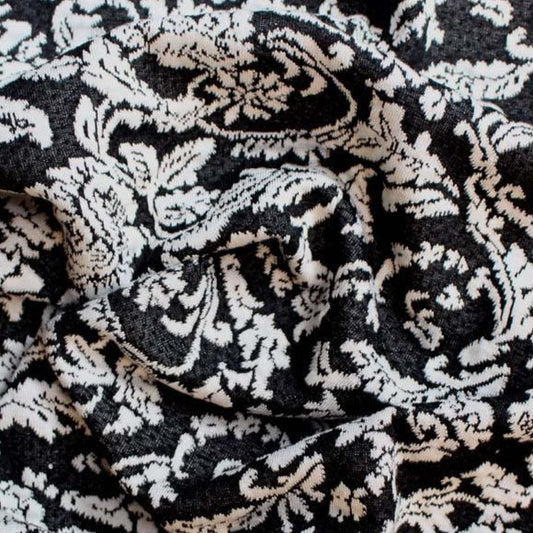 Showing roslyn a Stretch white colored Floral embroidered Heavy weight jacquard with traditional design black polyester and rayon with spandex