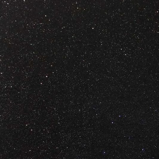 Showing roxy a black colored fabric with Glitter print on stretch polyester with spandex and featuring good drape