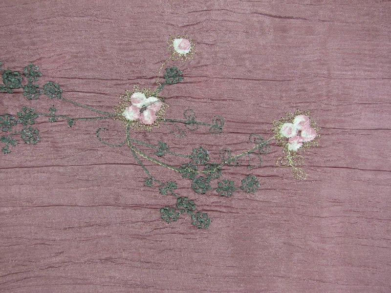Ruby presenting the rose color version of a crisp Pure Polyester Embroidered with simple floral pattern Crushed Taffeta Flat