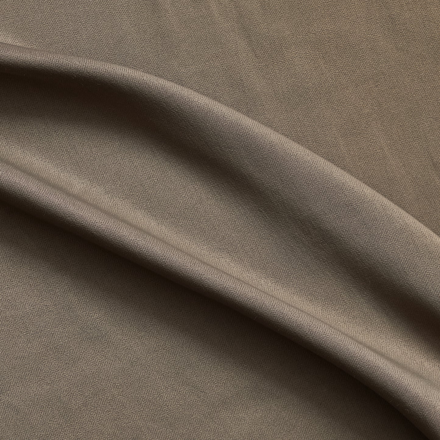 sakura presenting the khaki color version of a satin bamboo and viscose blend with both satin and matte faces featuring fluid drape