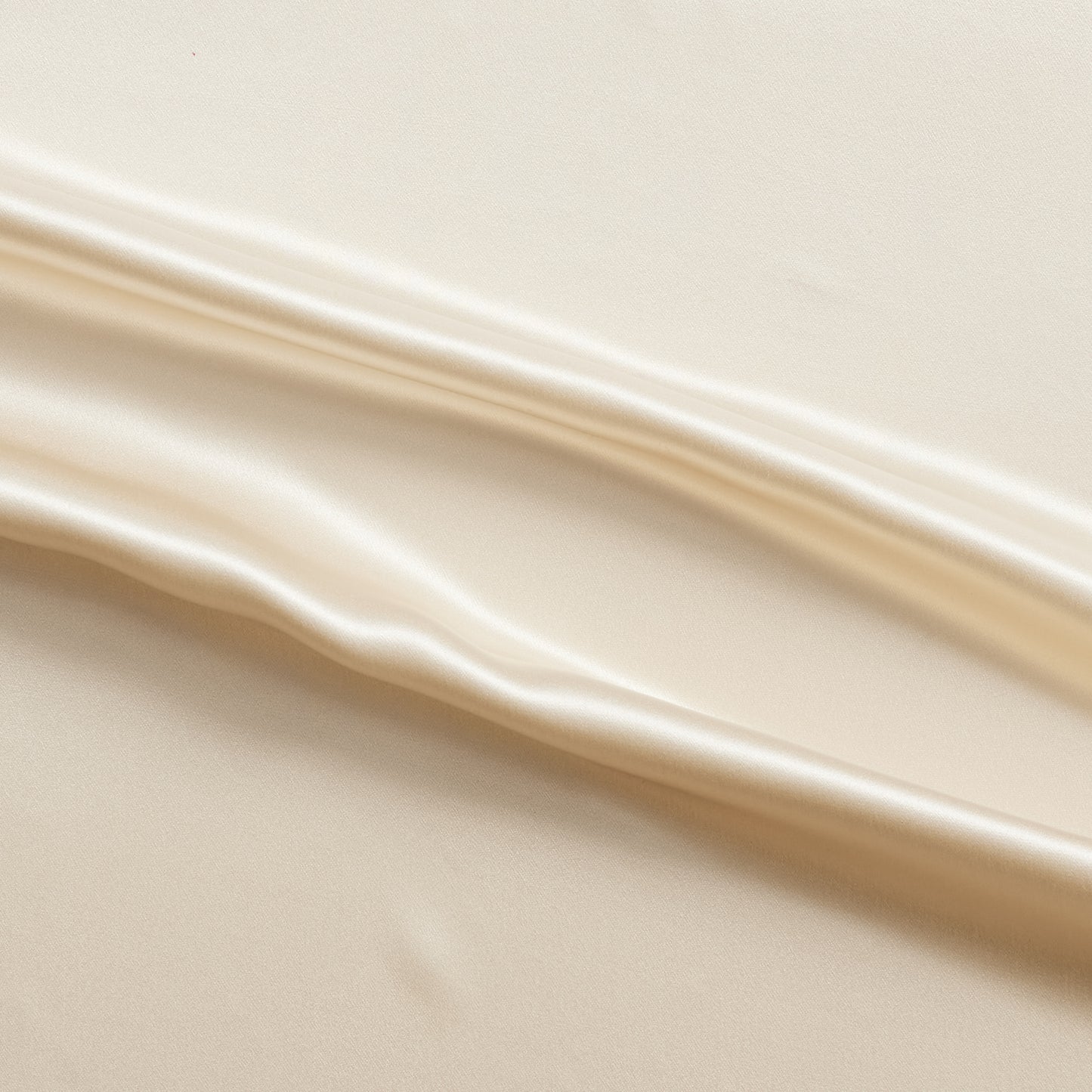 Silk Satin presenting the latte colour version with natural sheen and fluid drape