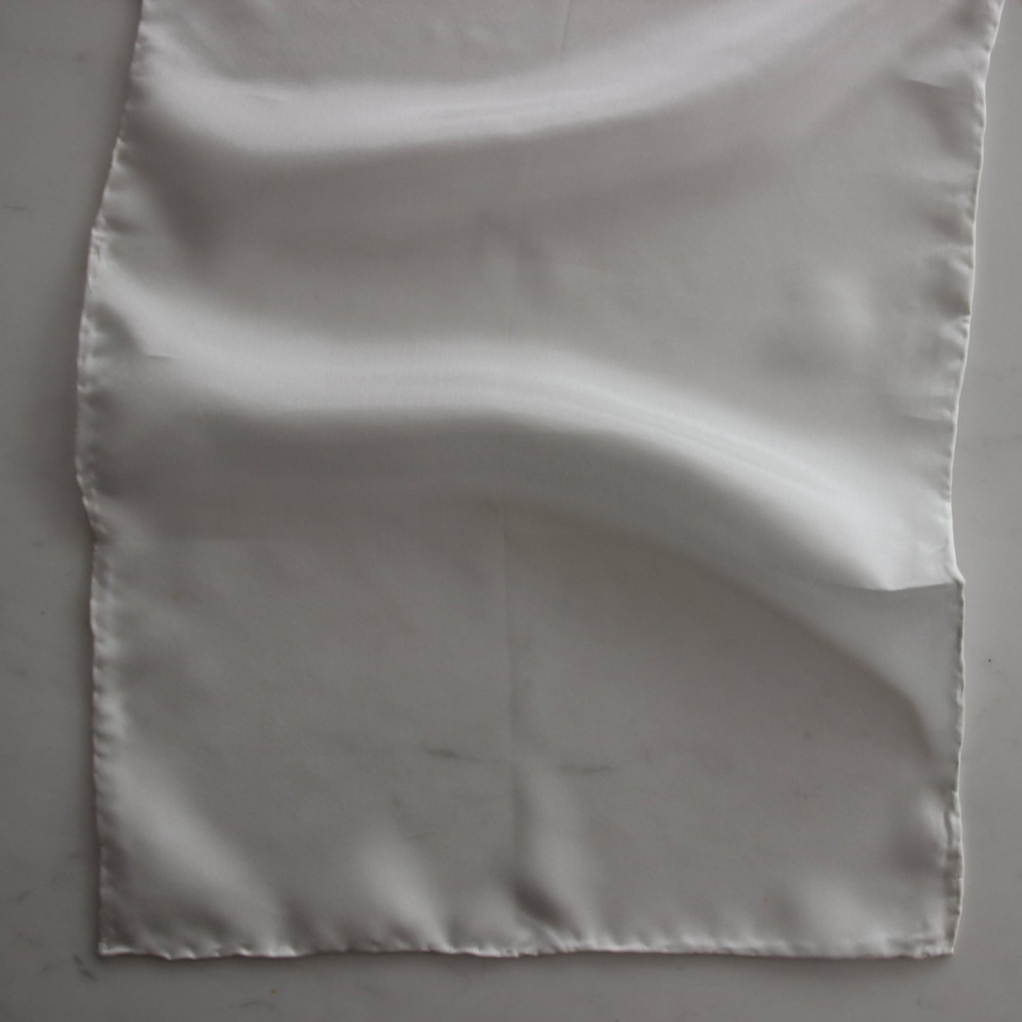 Presenting the JAP SILK scarf in natural color featuring a soft light weight pure silk scarf 28x160cm with fluid drape