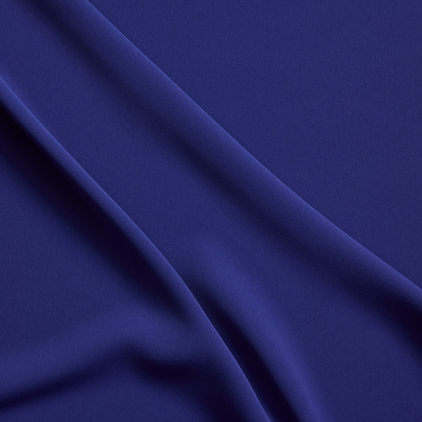 sensation presenting the cobalt color version of a medium weight silk faille-like pure polyester with weft natural stretch and fluid drape