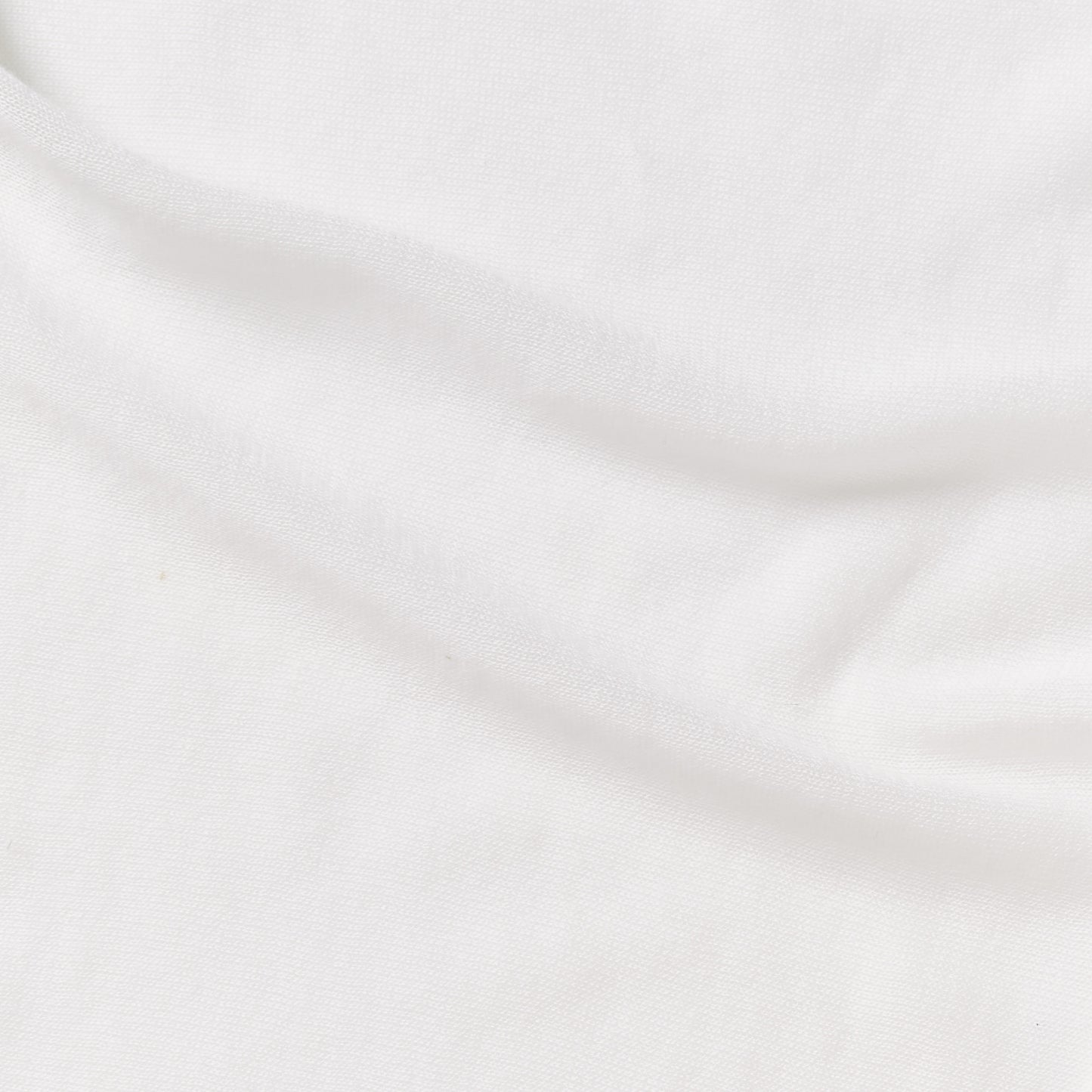 Sensation senza a white colored super soft sheer pure cotton knit with fluid drape
