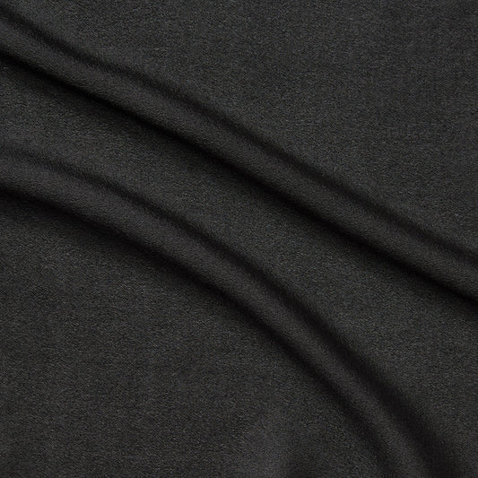 Showing shimmer a black colored fabric with metallic glitter print on Semi-sheer, soft pure silk georgette featurinmg good drape