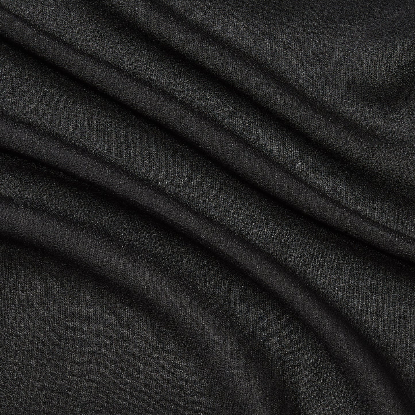 Presenting shimmer a black colored fabric with metallic glitter print on Semi-sheer, soft pure silk georgette featuring good drape
