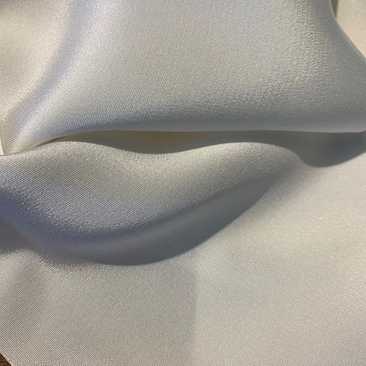 silk faille showing the natural color version of a heavy weight pure silk crepe de chine with soft matt sheen and fluid drape