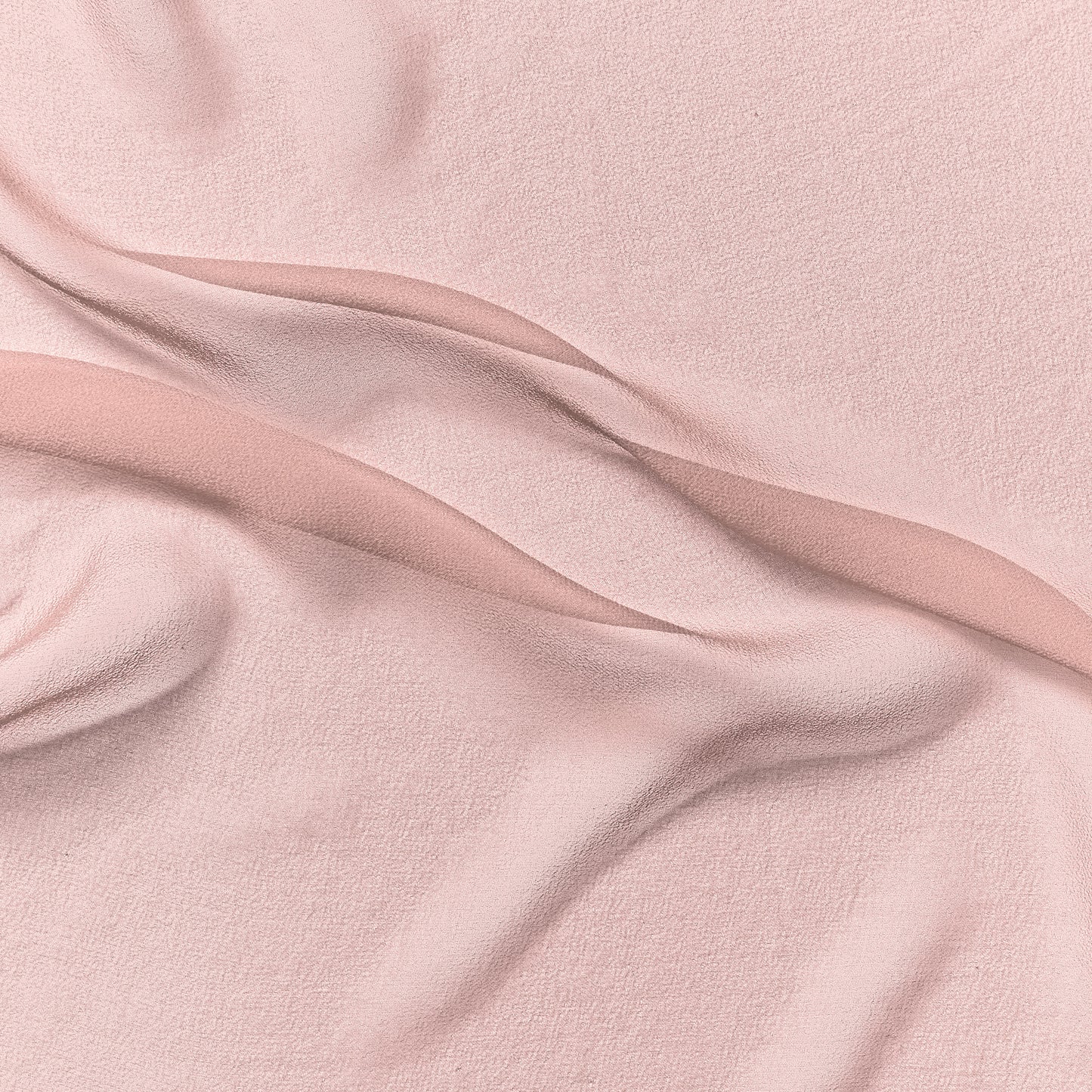 silk georgette presenting the dusty color version of a Lightweight sheer floaty pure silk with excellent drape great for layering and gathering