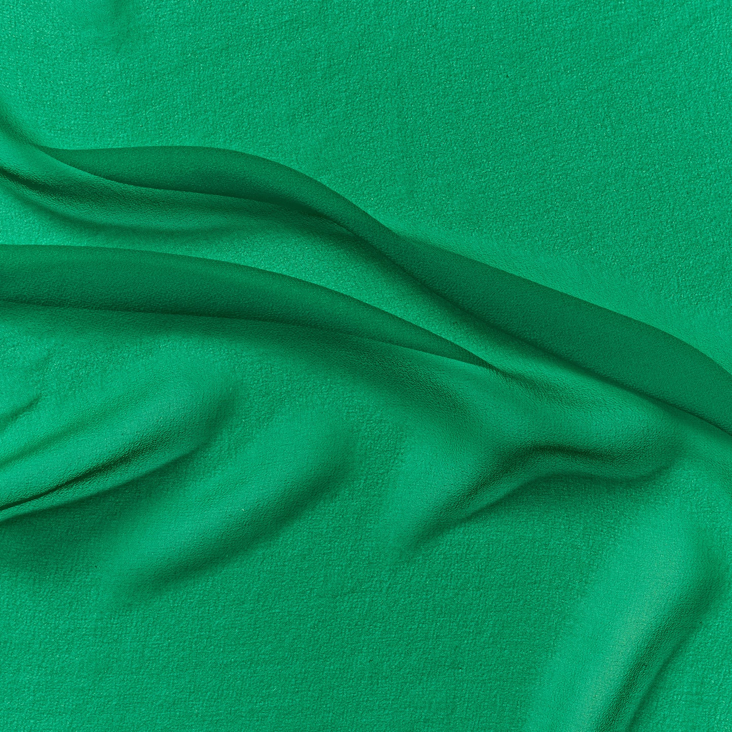 silk georgette presenting the kelly color version of a Lightweight sheer floaty pure silk with excellent drape great for layering and gathering