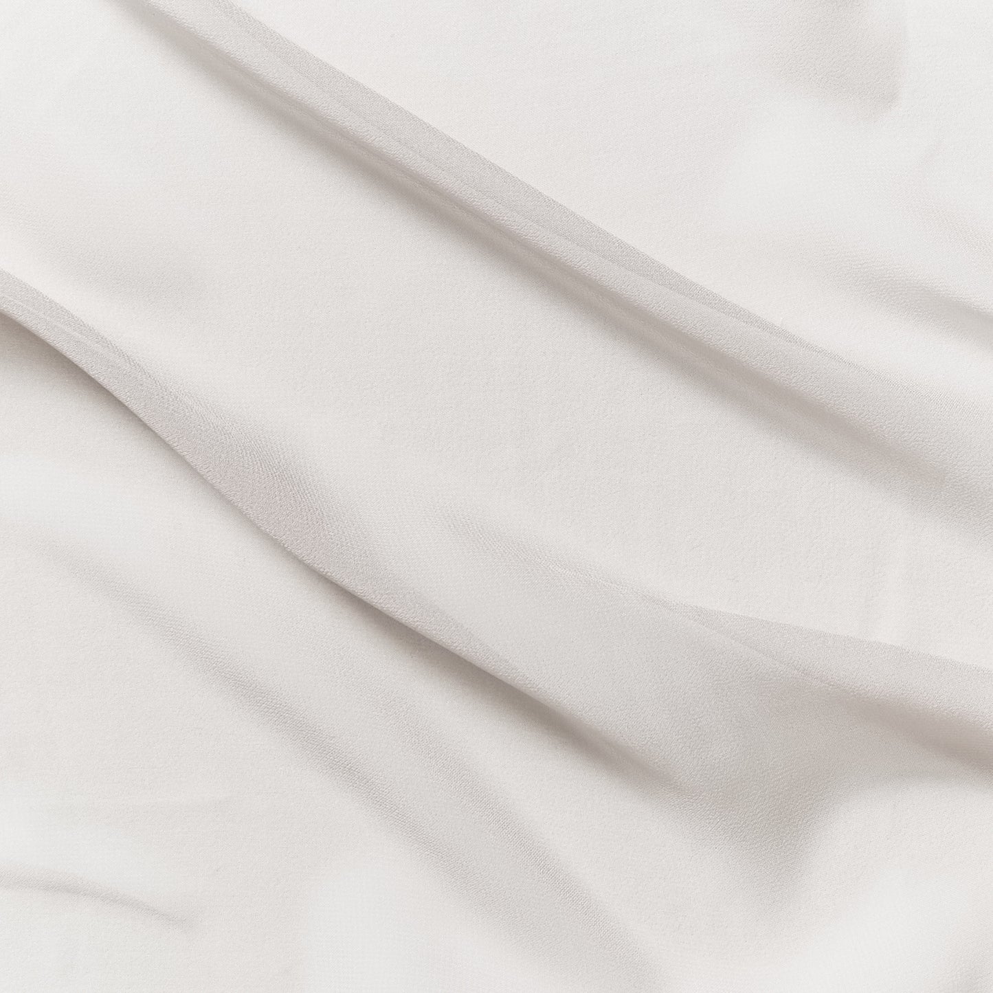 silk georgette presenting the silver color version of a Lightweight sheer floaty pure silk with excellent drape great for layering and gathering