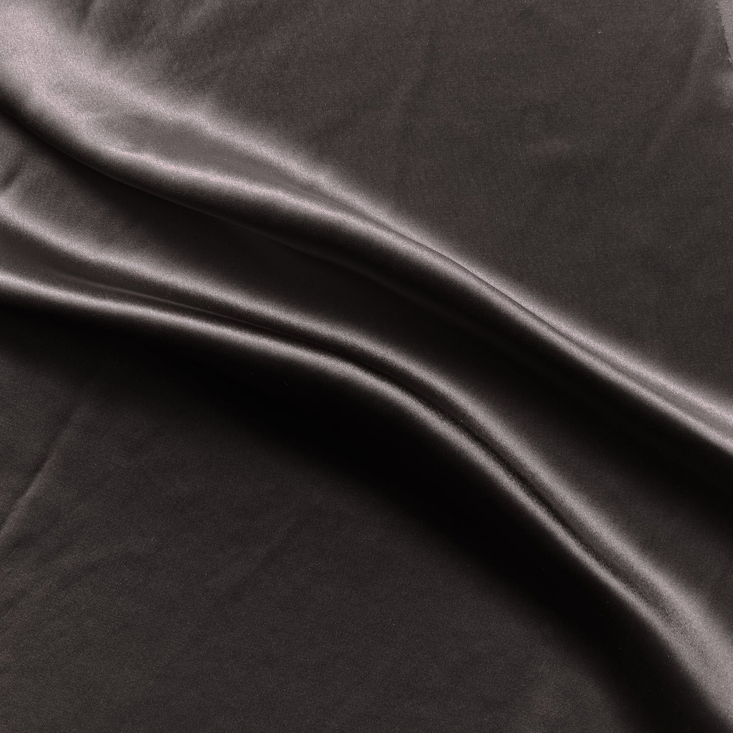 Silk Satin presenting the charcoal color version of a pure mulberry silk with natural sheen and fluid drape
