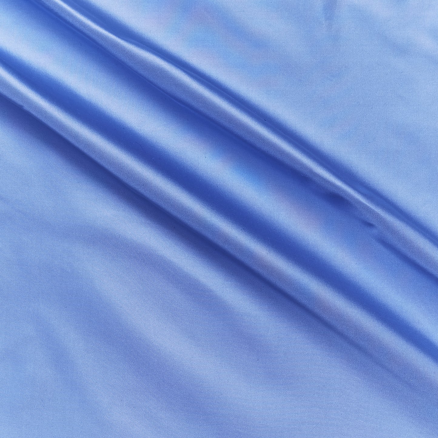 silk taffeta narrow presenting the china blue color version of a smooth crisp pure silk with good drape