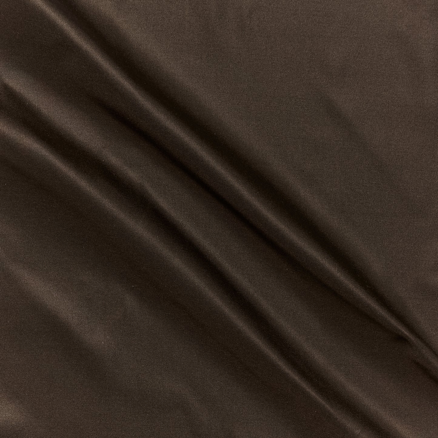 silk taffeta presenting the chocolate color version of a smooth crisp pure silk with good drape