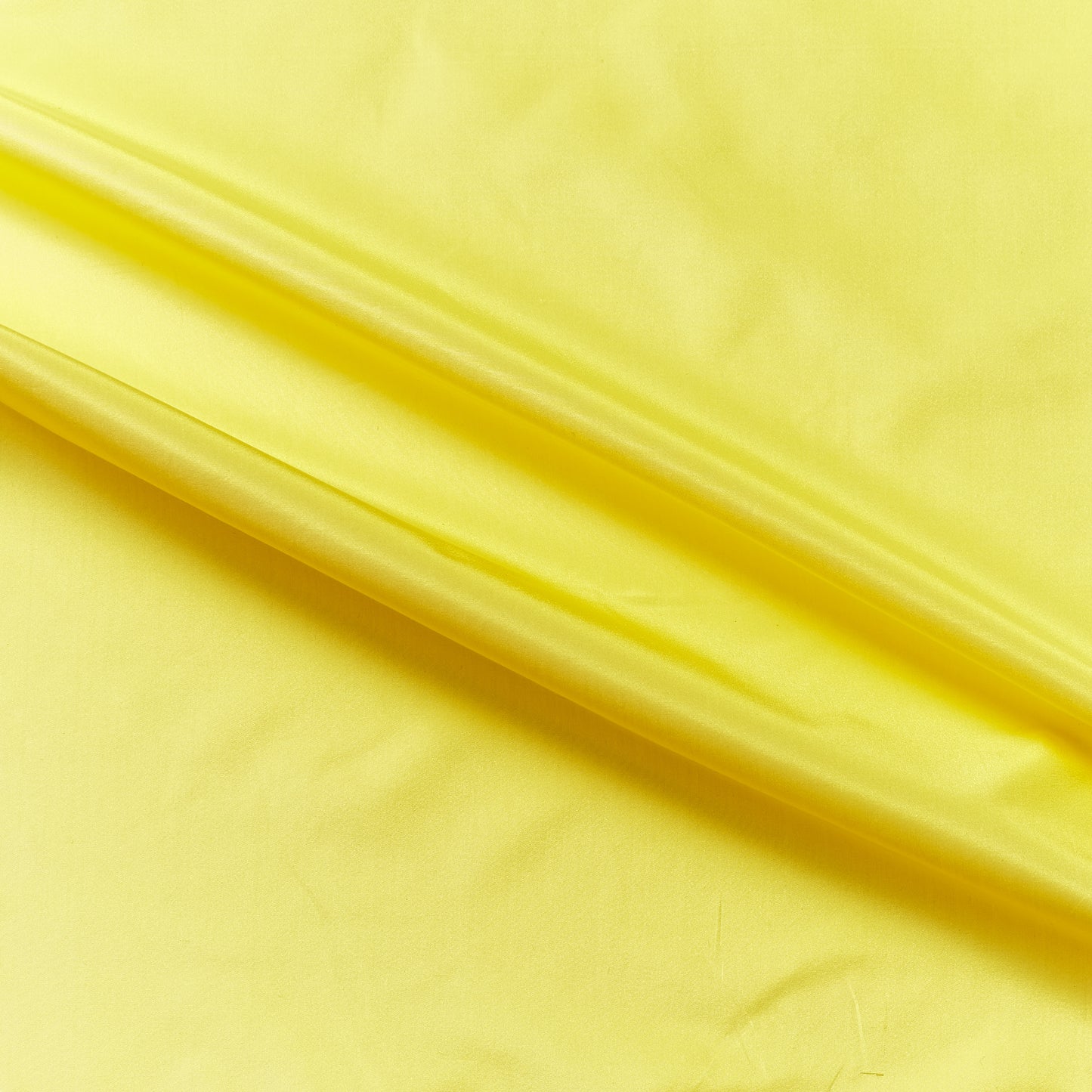 silk taffeta narrow presenting the lemon color version of a crisp smooth pure silk with good drape