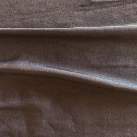 Showing silk and linen a coffee colored silk and linen blend with medium drape