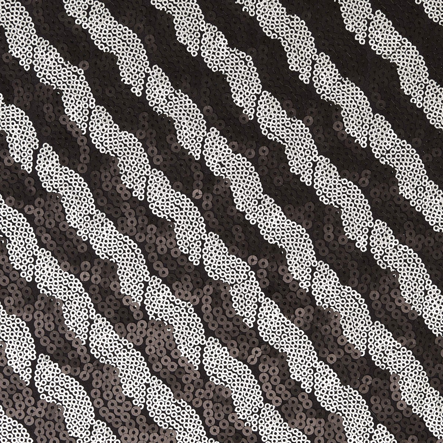 Presenting silverado showing black colored sequins in two toned stripes on stretch polyester with spandex with good drape