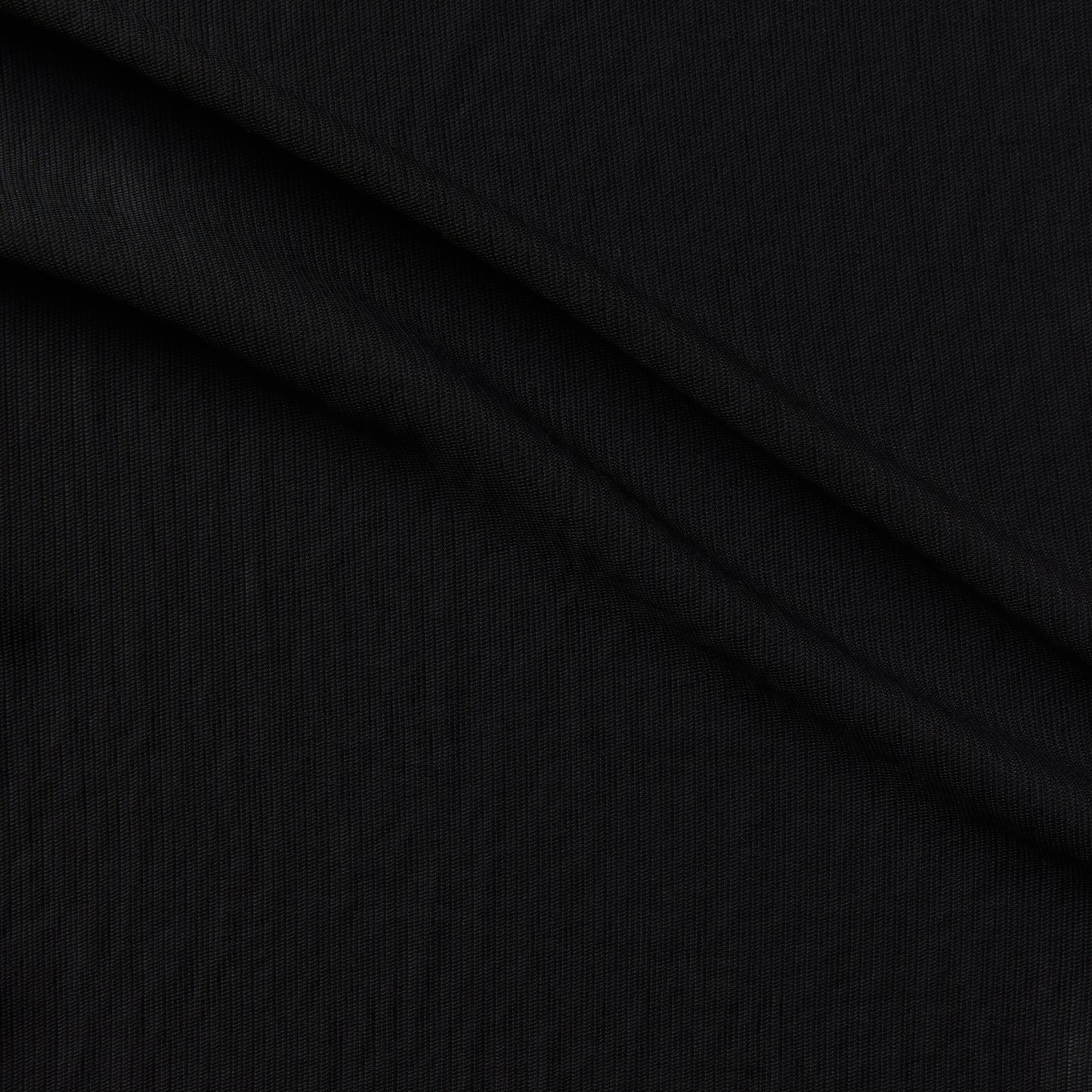 sirocco presenting the black color version of a soft pure polyester with textured face fluid drape and soft hand feel
