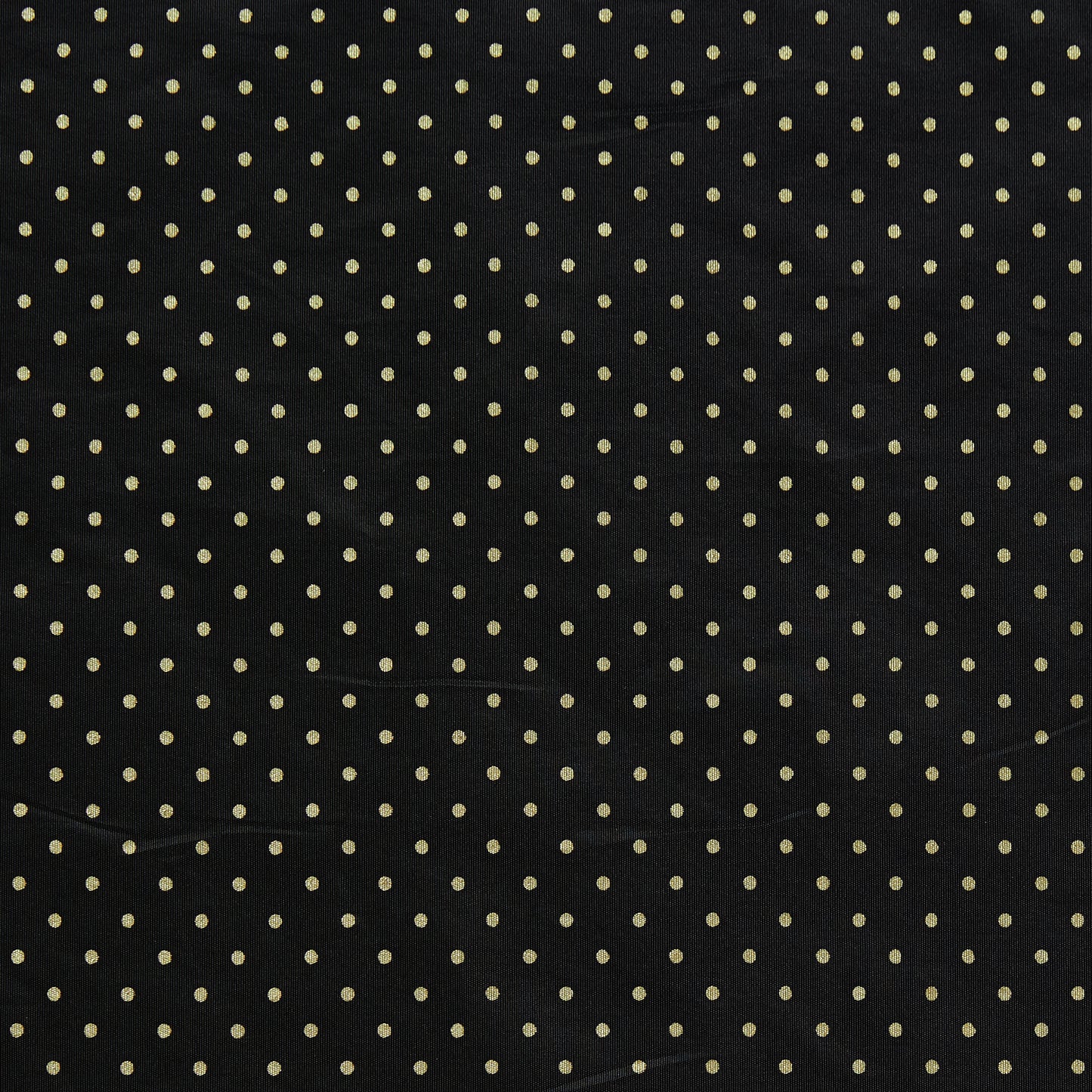 Spot gothic exhibiting a classic spot print on a black colored base crisp satin acetate fabric with moderate drape