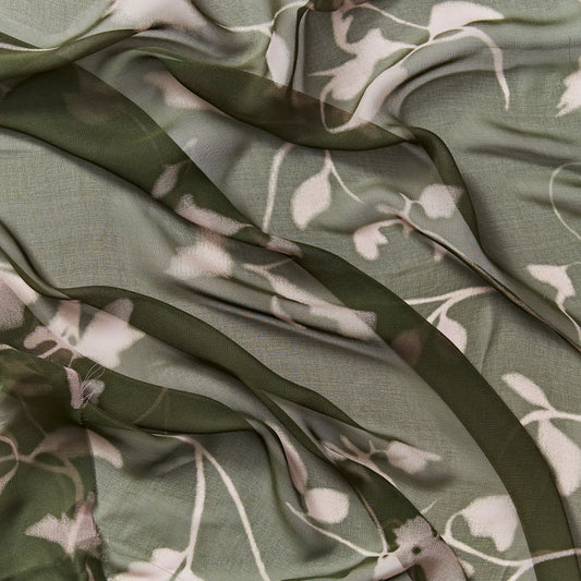sublime showing the floral print on khaki color version of a sheer pure silk georgette with fluid drape