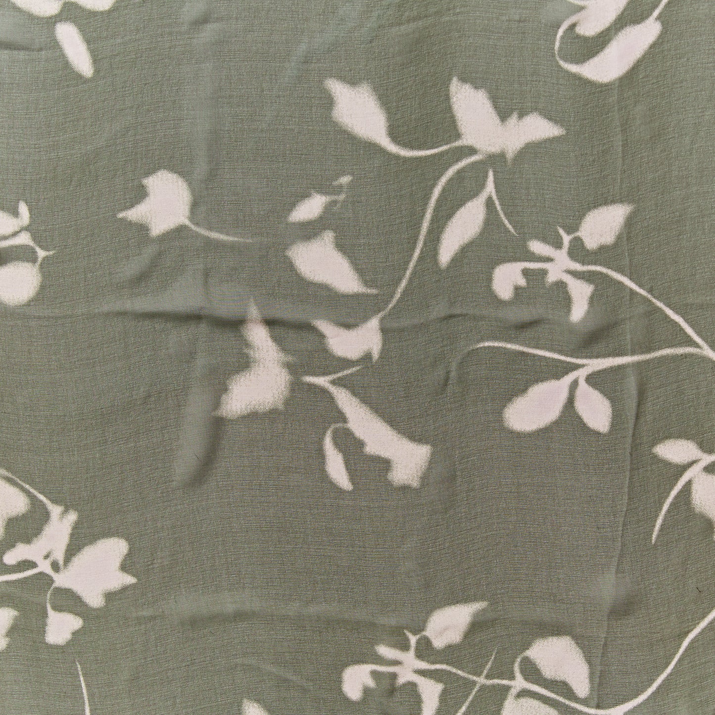 sublime presenting the floral print on khaki color version of a sheer pure silk georgette with fluid drape