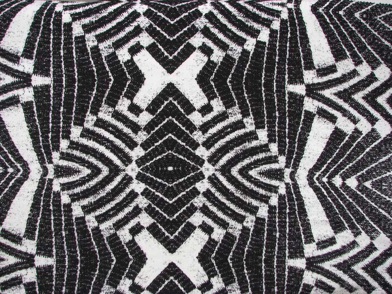Presenting the warrior black silk and viscose blend with warp print in closeup