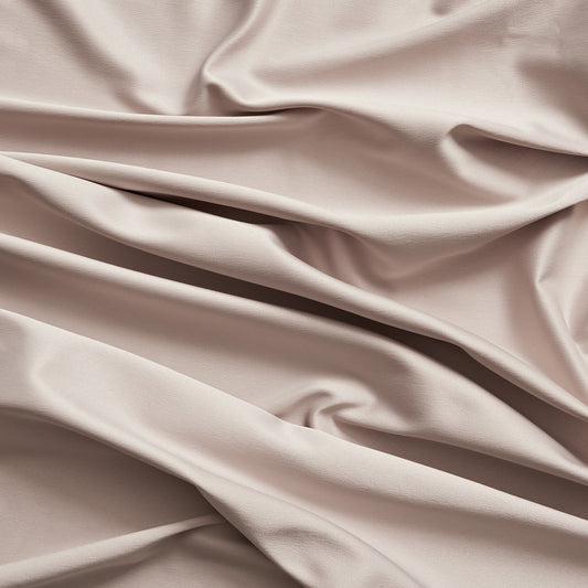 Trump presenting the Diamond color version of a stretch duchess satin polyester and lycra blend with a delustered smooth sateen finish and gutsy weight