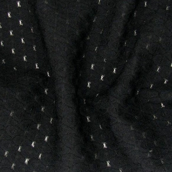 Tracy presenting the Black color Super Stretch mesh jacquard nylon and rayon with extra spandex