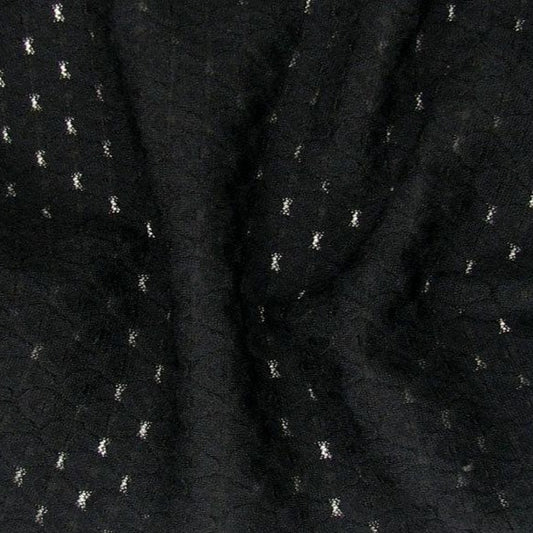 Tracy showing the Black color Super Stretch mesh jacquard nylon and rayon with extra spandex