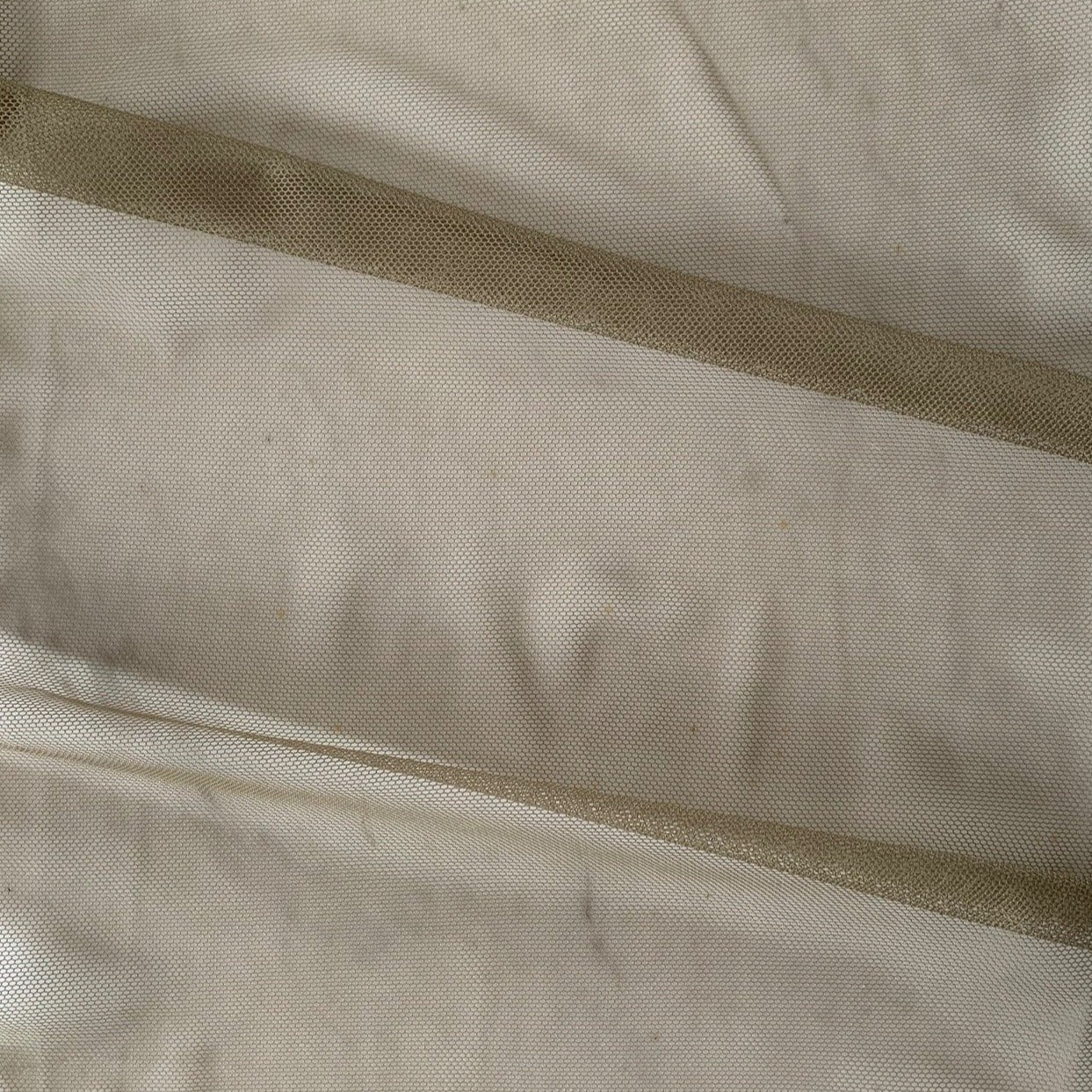 vapour presenting the ecru color variant of a soft sheer breathable light weight matte pure silk tulle with natural silk sheen