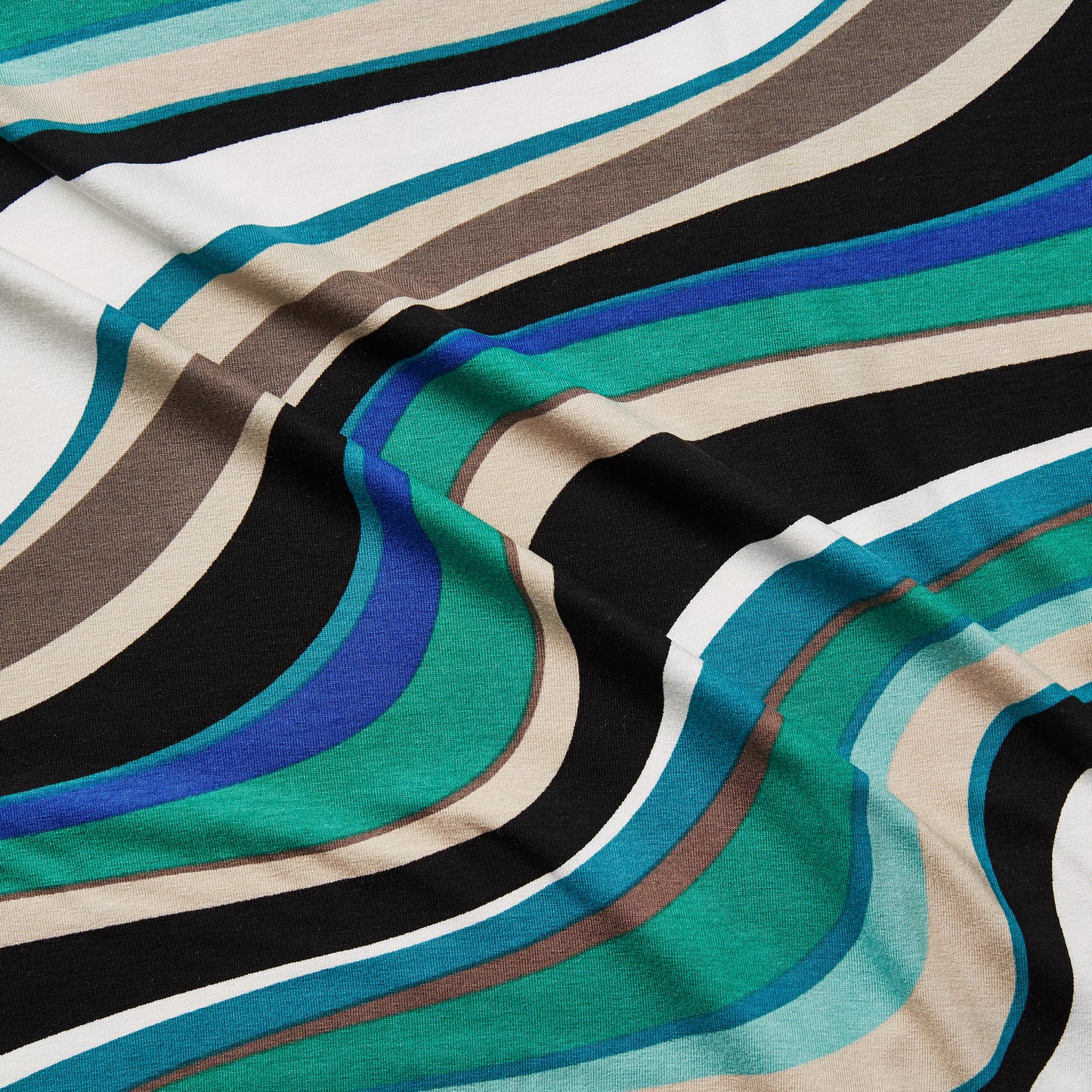 vortex presenting the jade color version of a stretch soft jersey knit with wavy digital print rayon with spandex for figure hugging