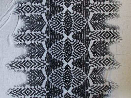 warrior showing a black silk and viscose blend with warp print