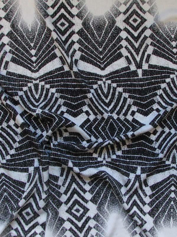 Presenting warrior exhibiting a black print on silk and viscose blend with warp print