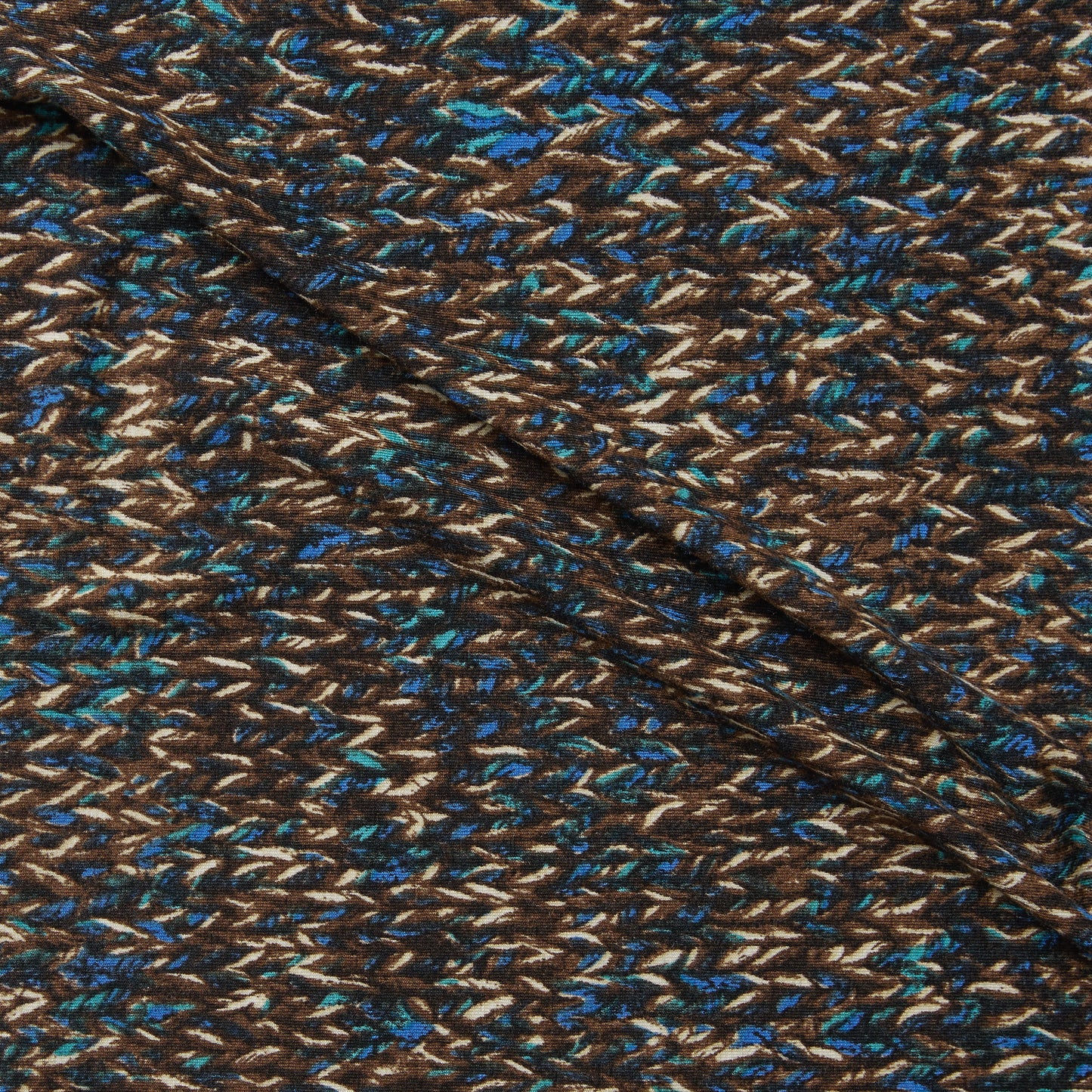 yardley presenting the blue colors version of a soft stretch rayon and spandex jersey knit with digital yarn print for dresses and skirts