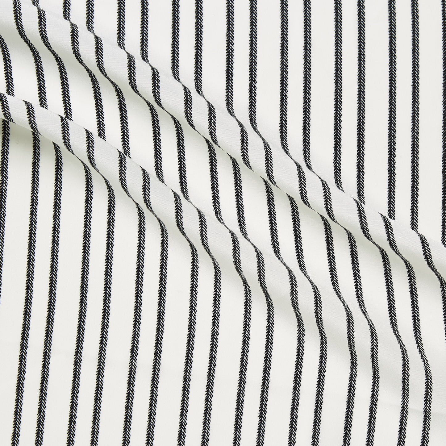zip presenting a white and black colored pure polyester striped rope print with slight sheen and fluid drape